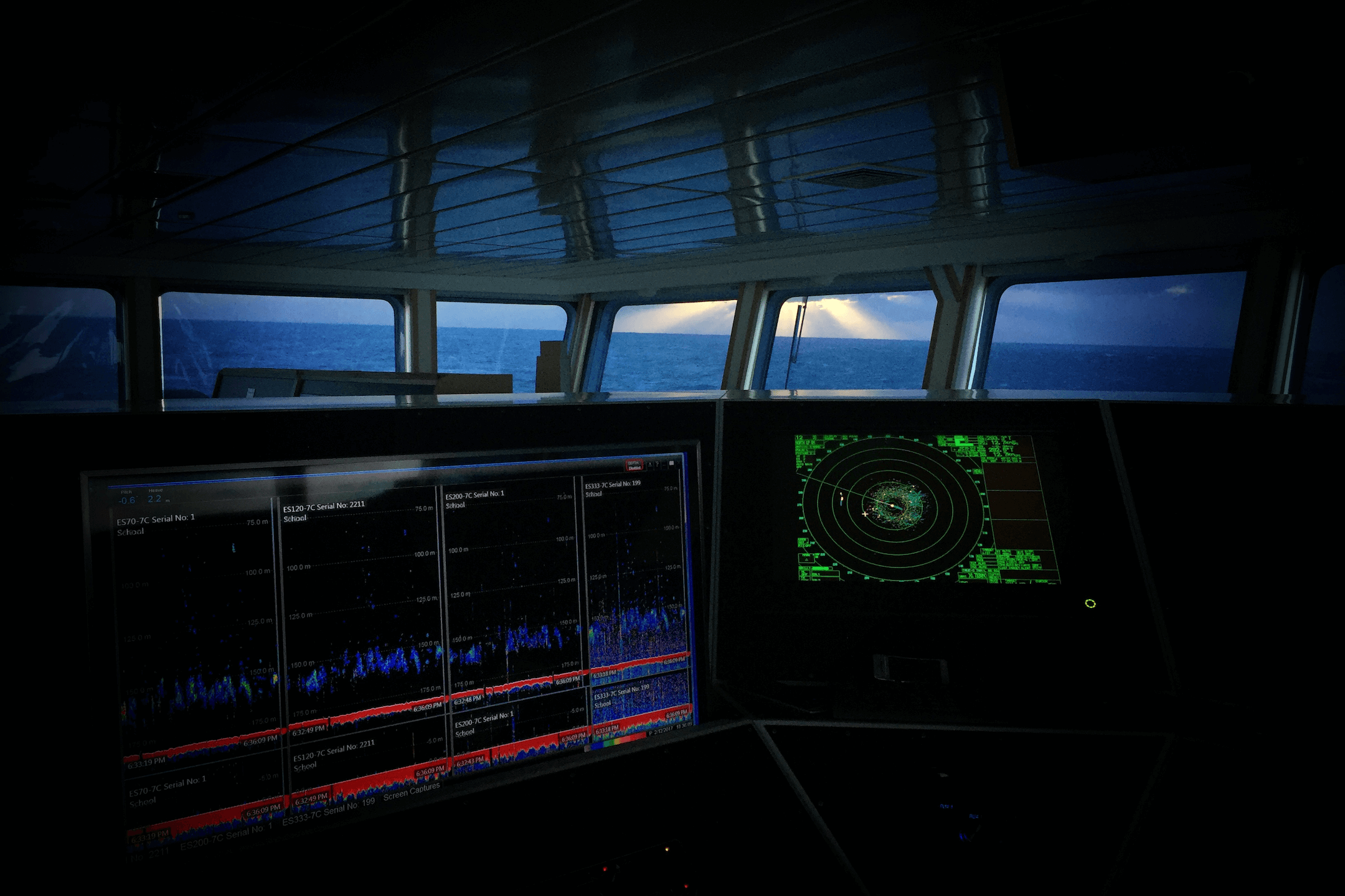 Vessel bridge with echosounder displays and radar — where OceanBox lives